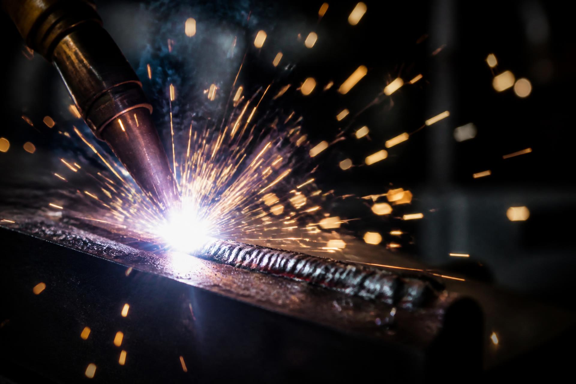 MIG welding arc with molten sparks